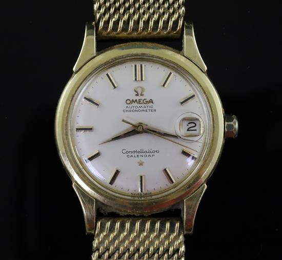 A gentlemans early 1960s 18ct gold Omega Constellation Calendar automatic wrist watch,